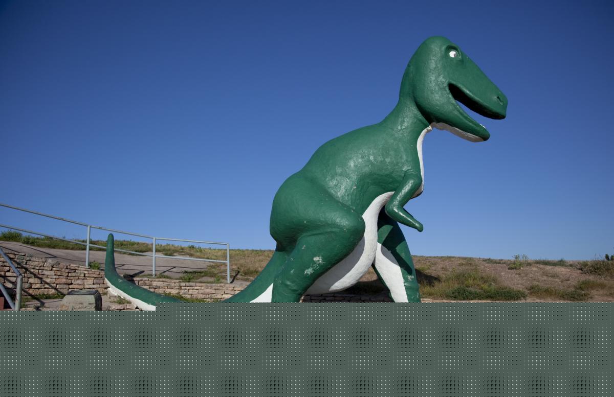 A green dinosaur statue at Dinosaur Park in Rapid City, South Dakota